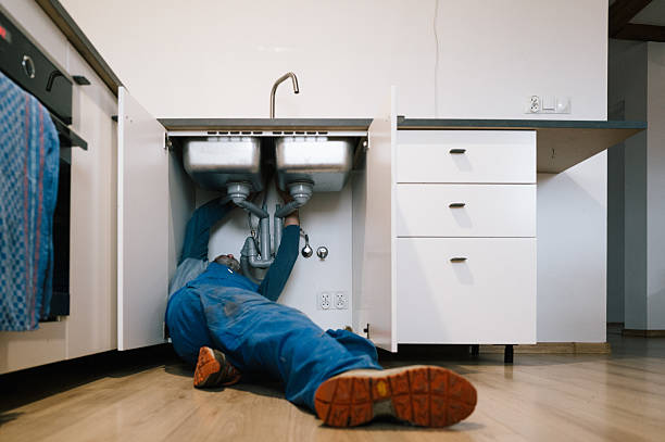 Professional Drain Cleaning technician working in Hicksville, NY